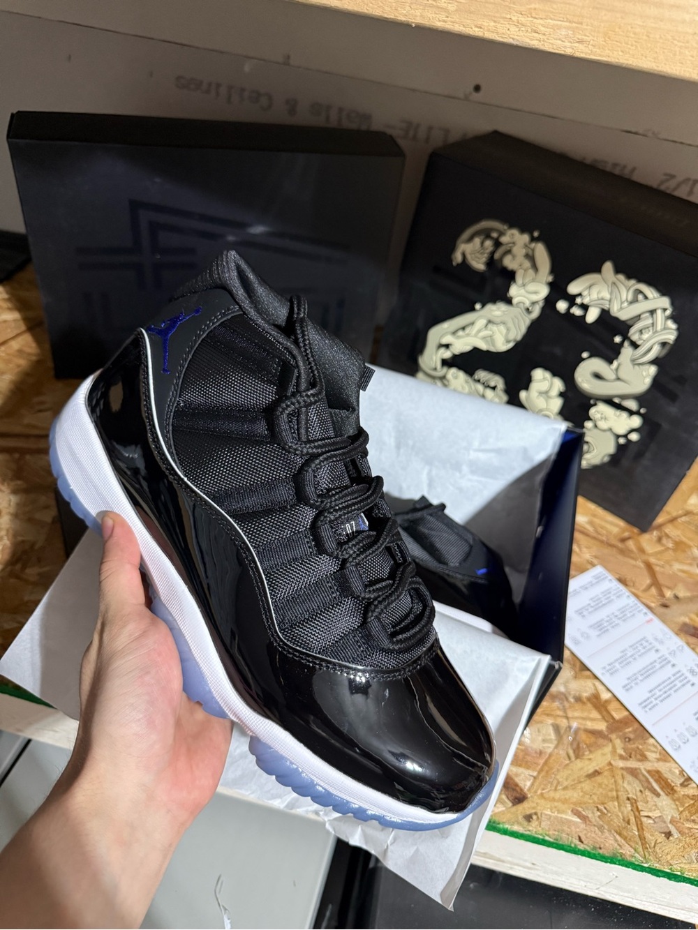 Jordan 11 Retro Space Jam Men's Retro in Black with Blue Accents